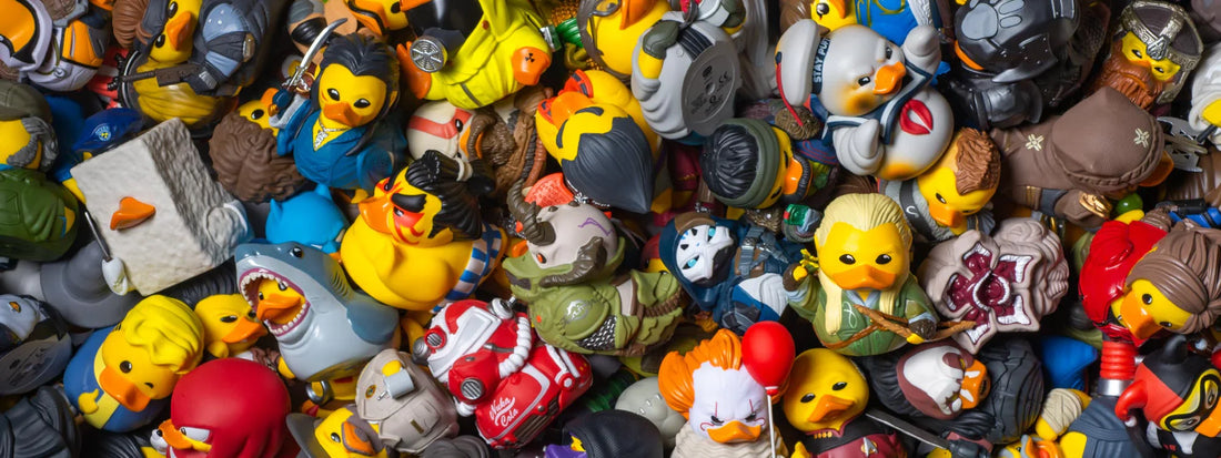 Large collection of TUBBZ collectible ducks featuring characters from popular video games, movies, and TV shows.